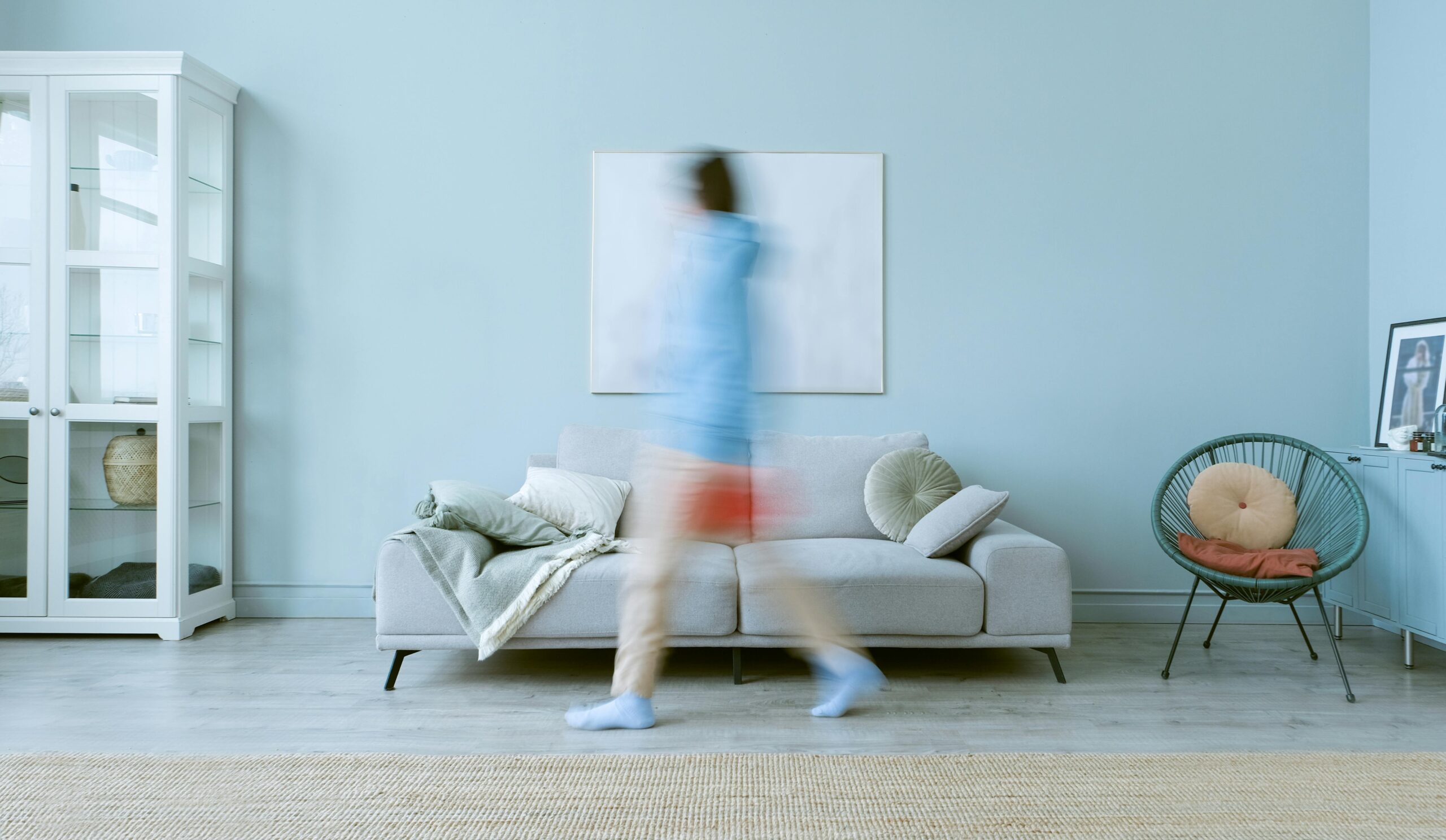 Person on walking pad at home